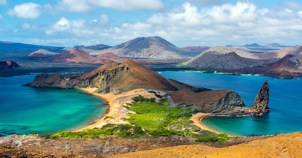 the Galapgos from the vantage points of one of the many mountains in the region where guests on a luxury yacht charter can expect to discover many rare species of animals