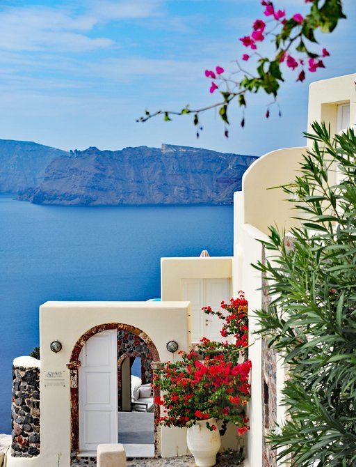 Flower covered walls in Oia, Santorini