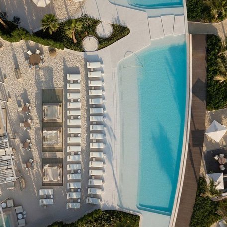 Aerial view looking down on the SAN Beach beach club in Dubai