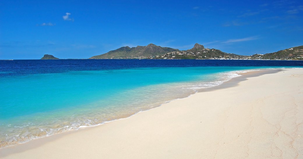 A deserted sandy beach in Grenada