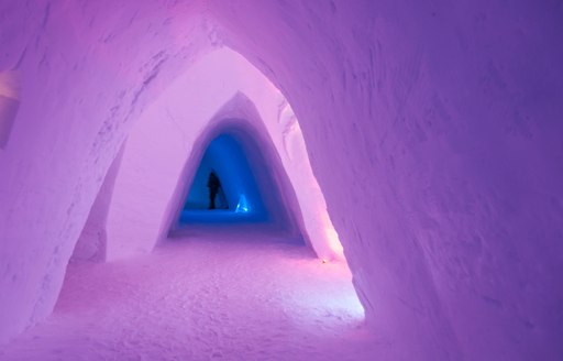 Colorful pink entrance made of ice at the Snow Hotel, Kirkenes, Norway