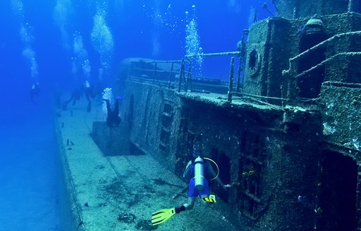 A group diving a wreck in the Solomon islands